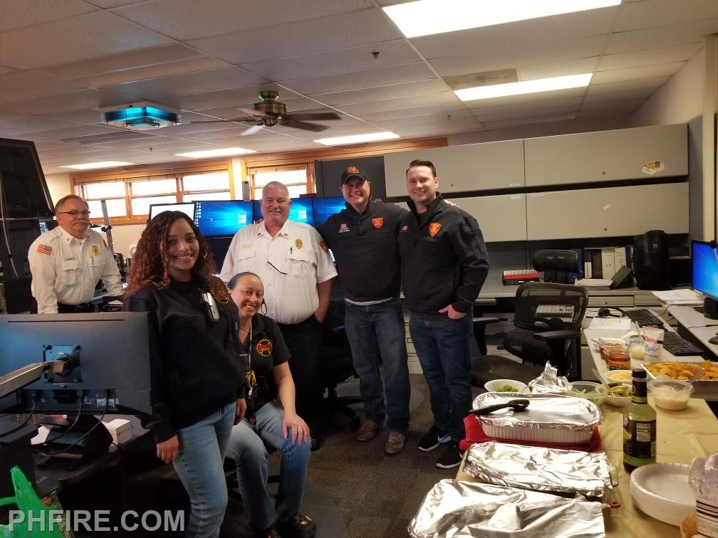PHFD members serving lunch to RED Center telecommunicators in honor of National Telecommunicator Week