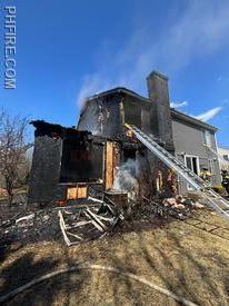 Rear of two-story house that was severely damaged by a fire